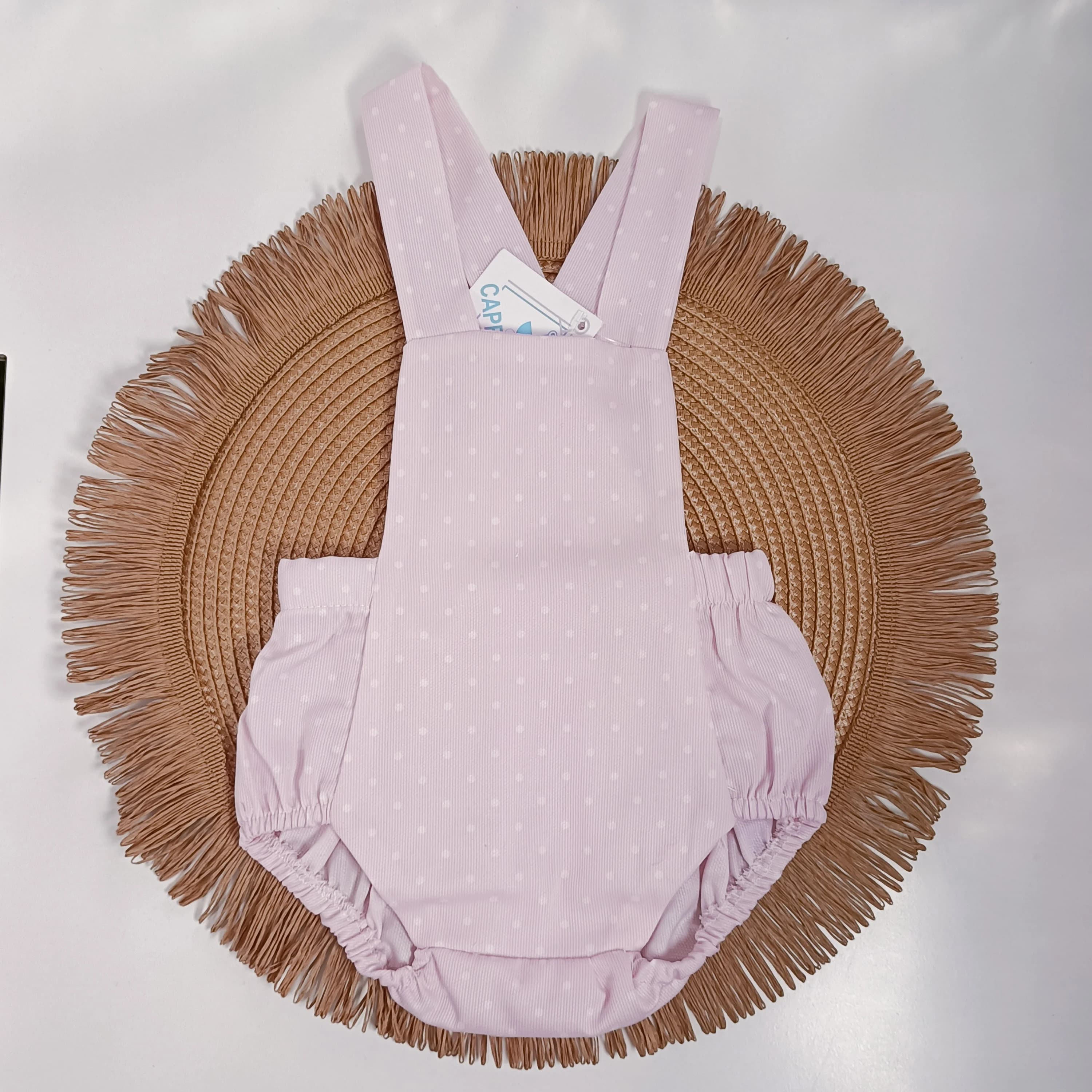 Ranita / peto de bebé niña con lunares color rosa.