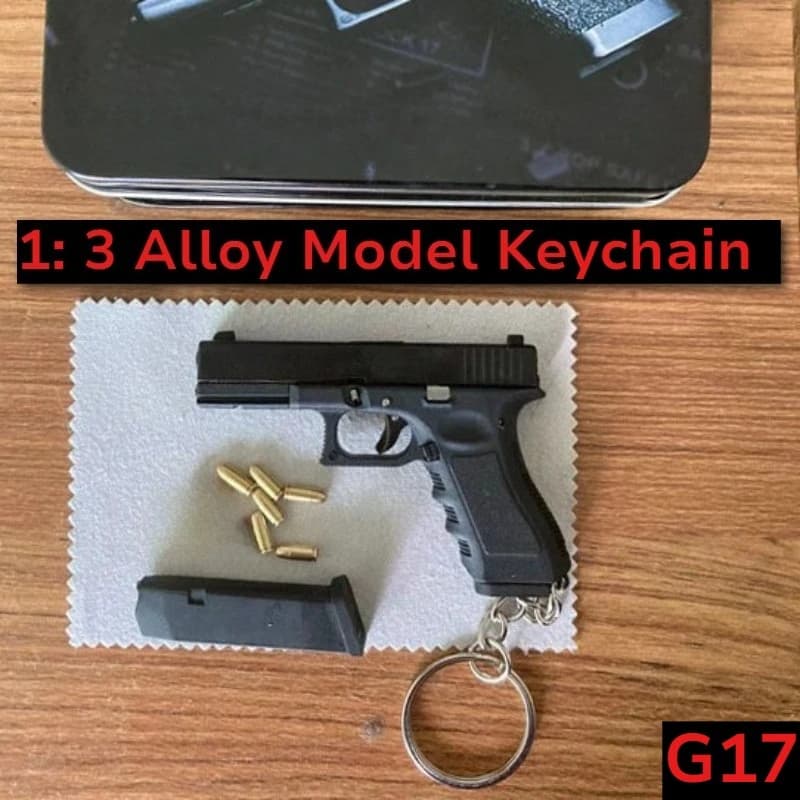 Modelo Alloy1:3 G17 con llavero, modelo de pistola, adornos, simulación, equipo de soldado desmontable con balas, juguetes decorativos, 1 ud.