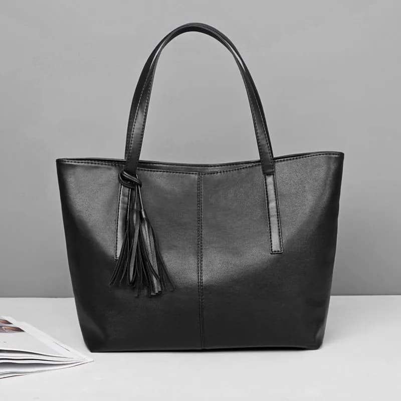 Bolsos de mano de gran capacidad para mujer, bolso de mano con diseño de borla Retro, bandolera de cuero de PU de marca de lujo, bolso principal con