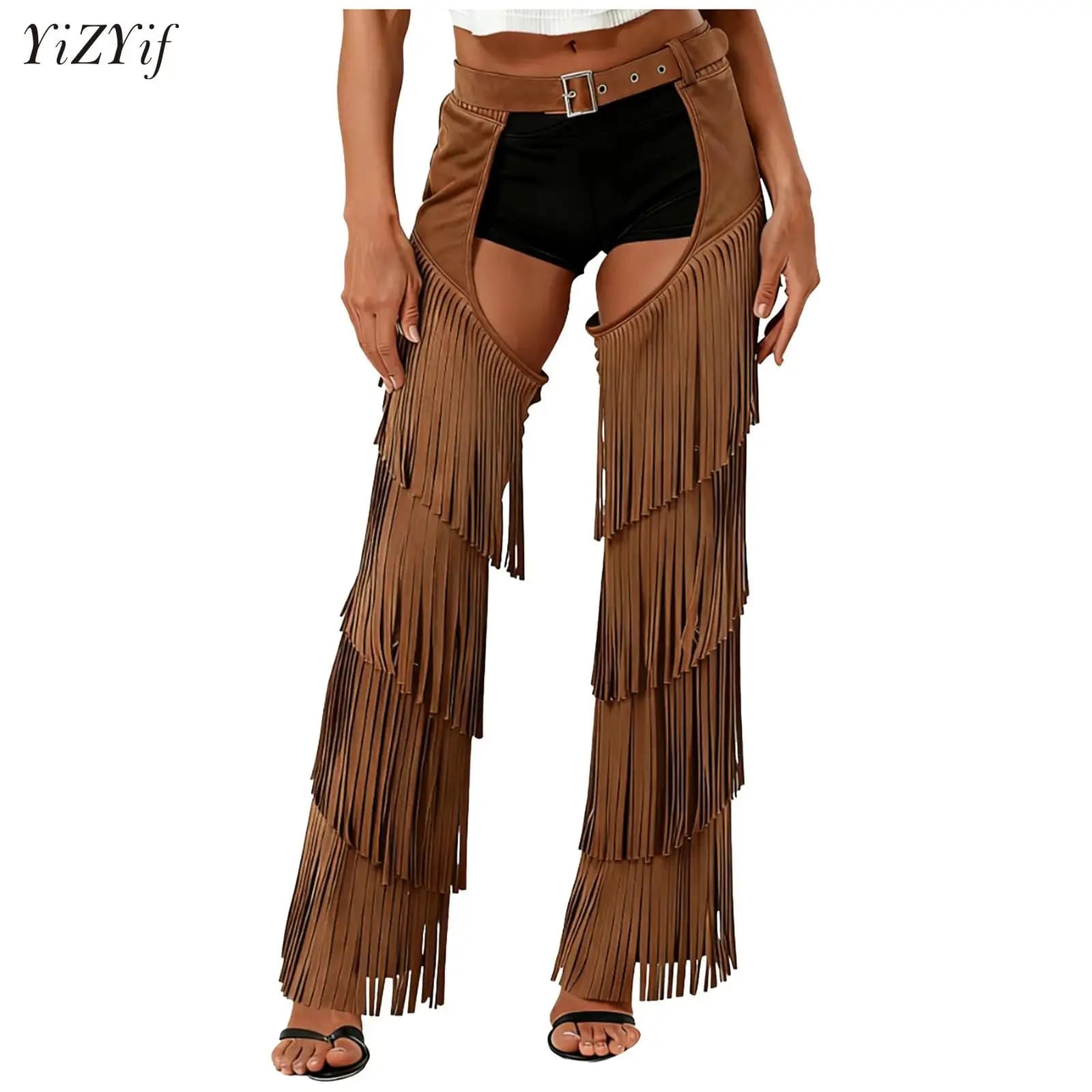Pantalones largos unisex estilo vaquero occidental de gamuza sintética con borlas, diseño calado, entrepierna abierta, cintura con hebillas, para