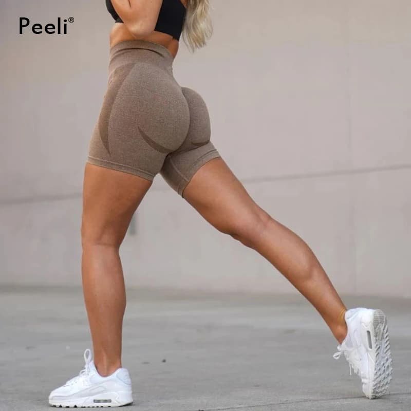 Pantalones cortos sin costuras de contorno para mujer, pantalones cortos de Yoga con realce de botín, pantalones cortos de entrenamiento para