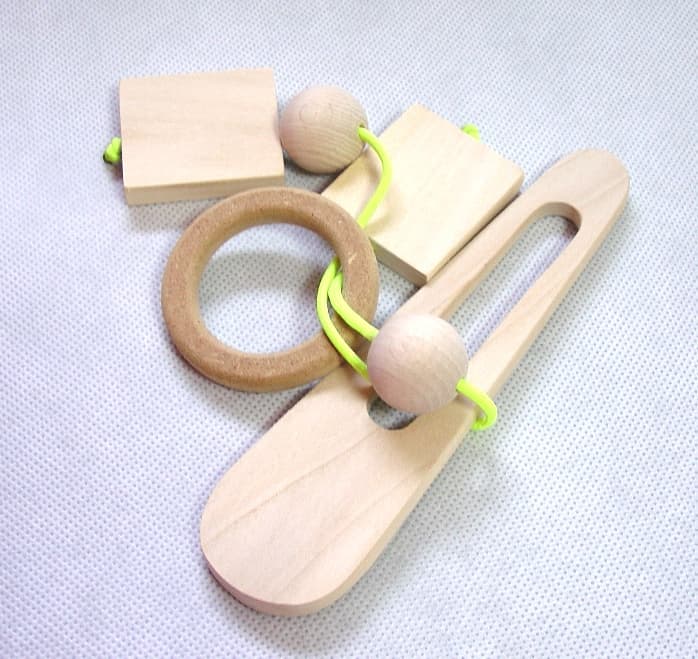 Rompecabezas de madera de anillo